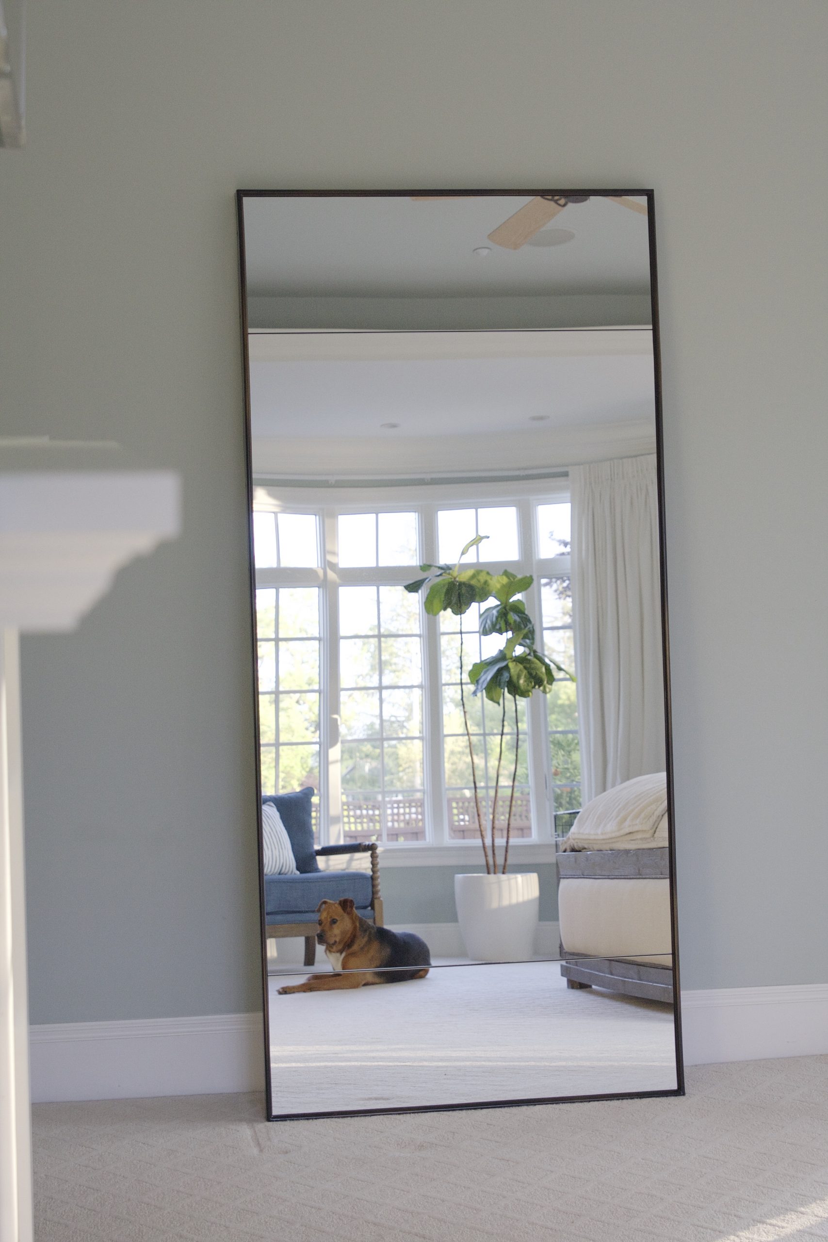 At Home Our Master Bedroom Floor Mirror simply organized